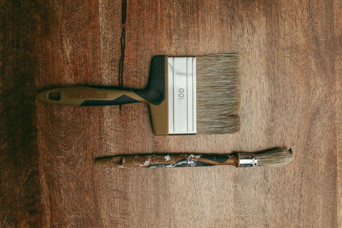 Paintbrushes on a Wooden Surface