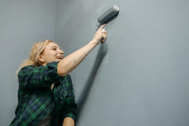 Photo by Pavel Danilyuk Woman Painting Wall with a Paint Roller