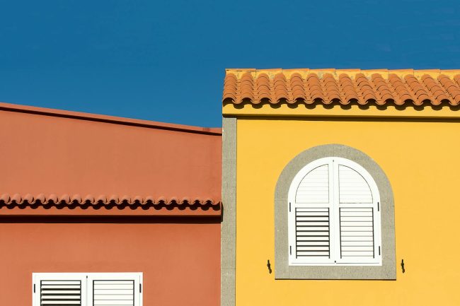 Photo by Jan van der Wolf Buildings with White Shutters